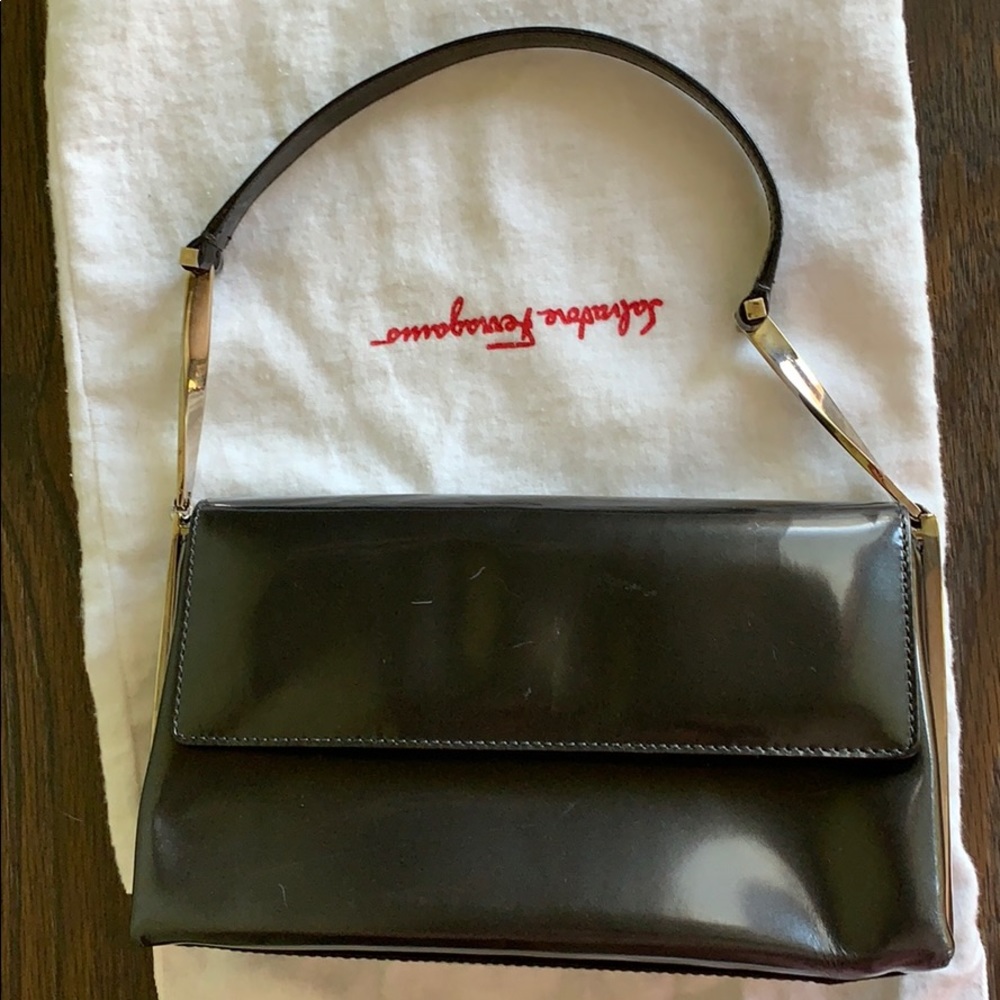 Salvatore Ferragamo black patent clutch Italy
